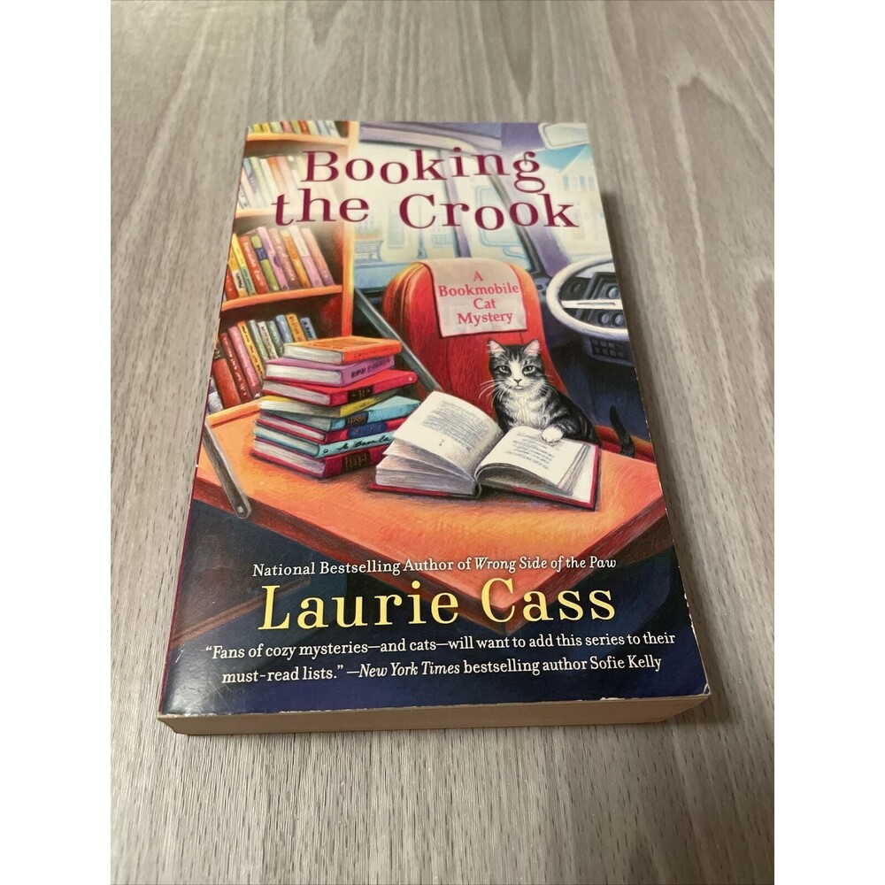 A Bookmobile Cat Mystery Series.: Booking the Crook by Laurie Cass 2019